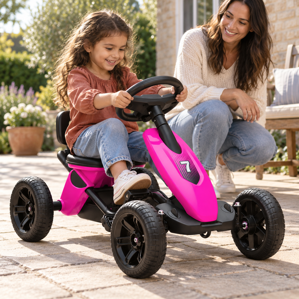 A child using the Kids Pedal Go Kart with Forward and Reverse Pedalling during play