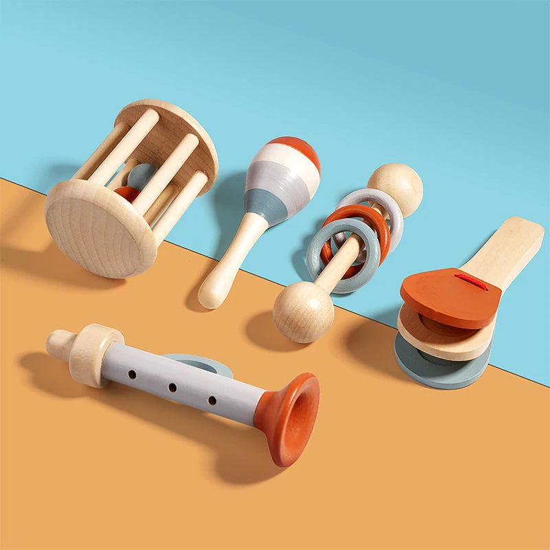 Five wooden musical instruments with rattles, maraca and castanets