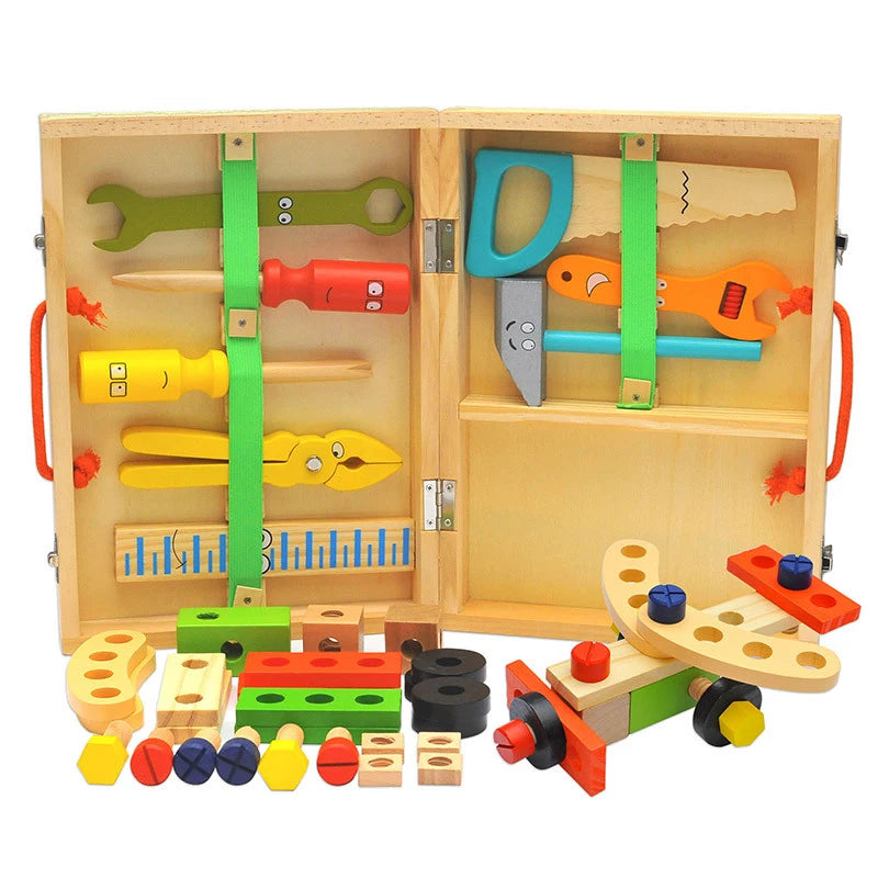 Open wooden tool box with toy tools and construction pieces