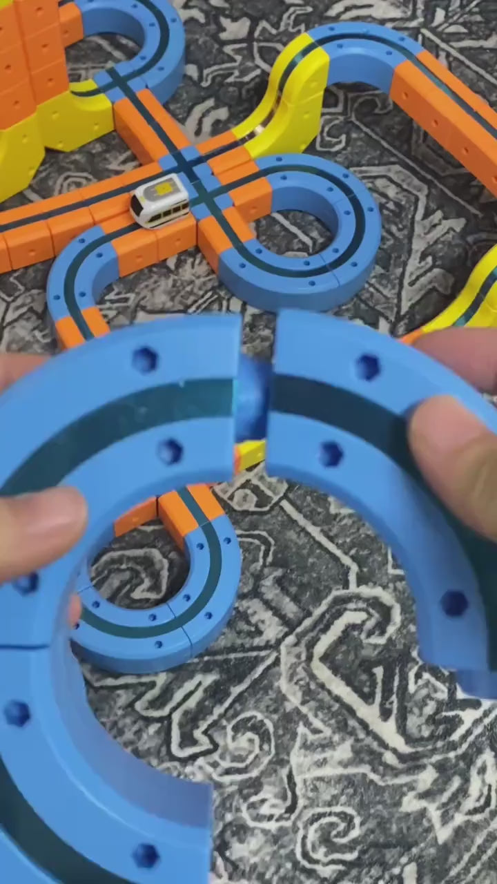 Magnetic Monorail Train Building Set demonstration: joining magnetic track pieces and the train riding the layout
